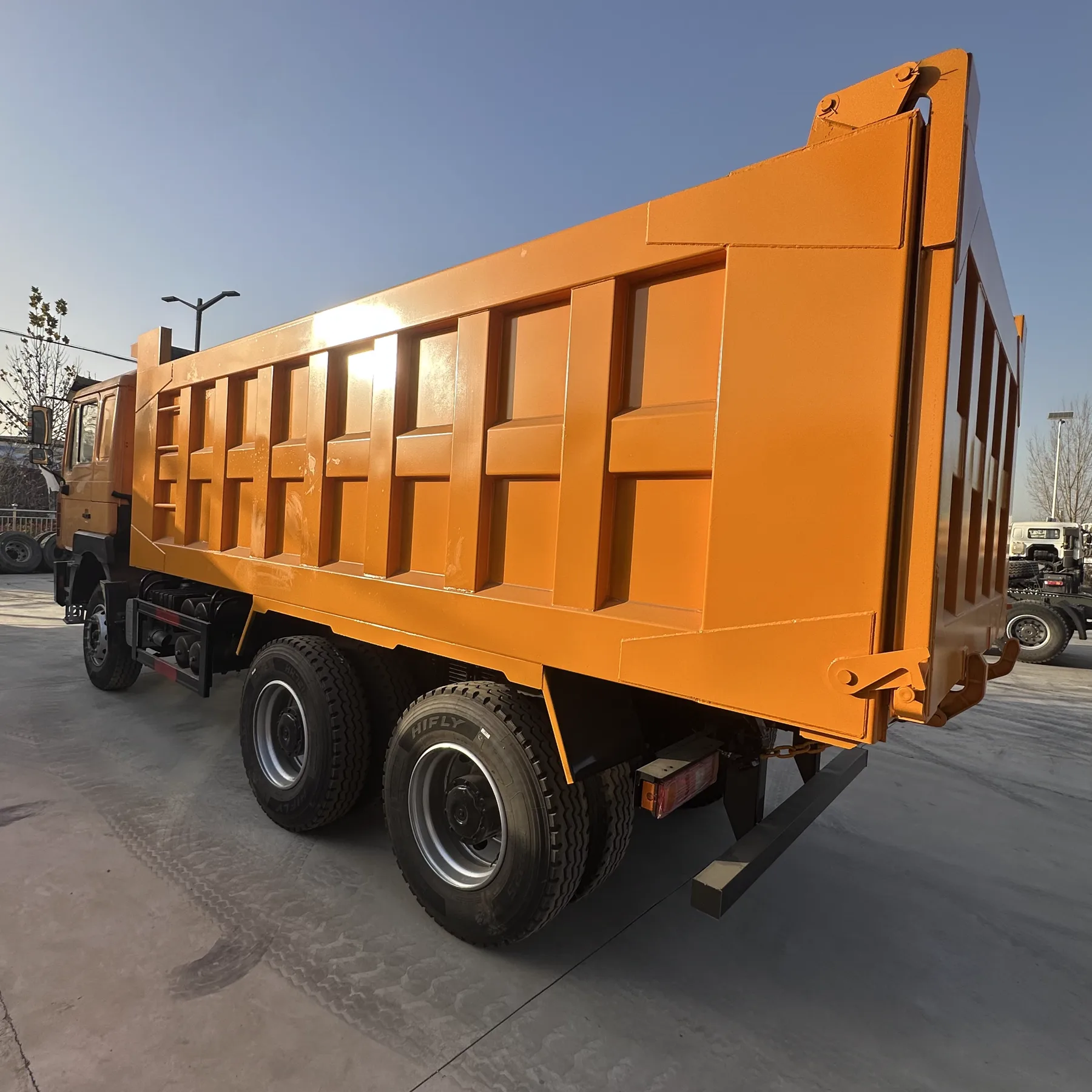 Yellow SHACMAN F3000 dump truck side view
